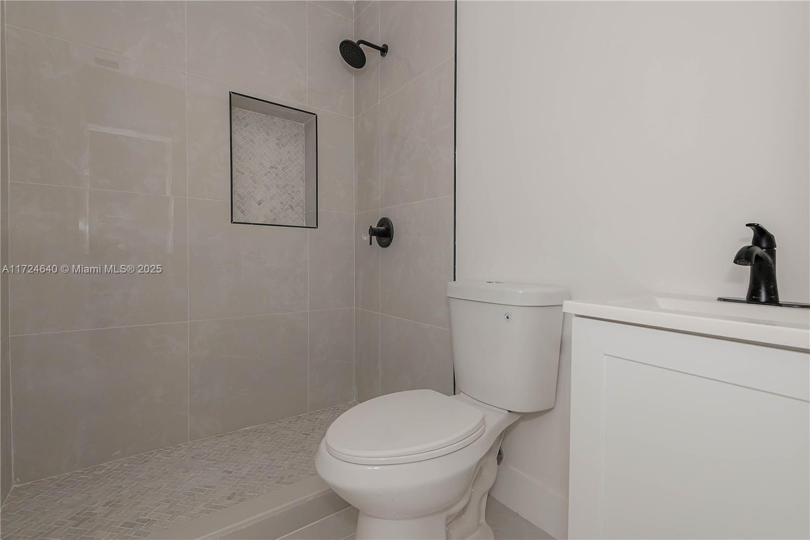 Coral Gate Miami, FL 33135 - Photo 20 of 23 a bathroom with a toilet and a sink