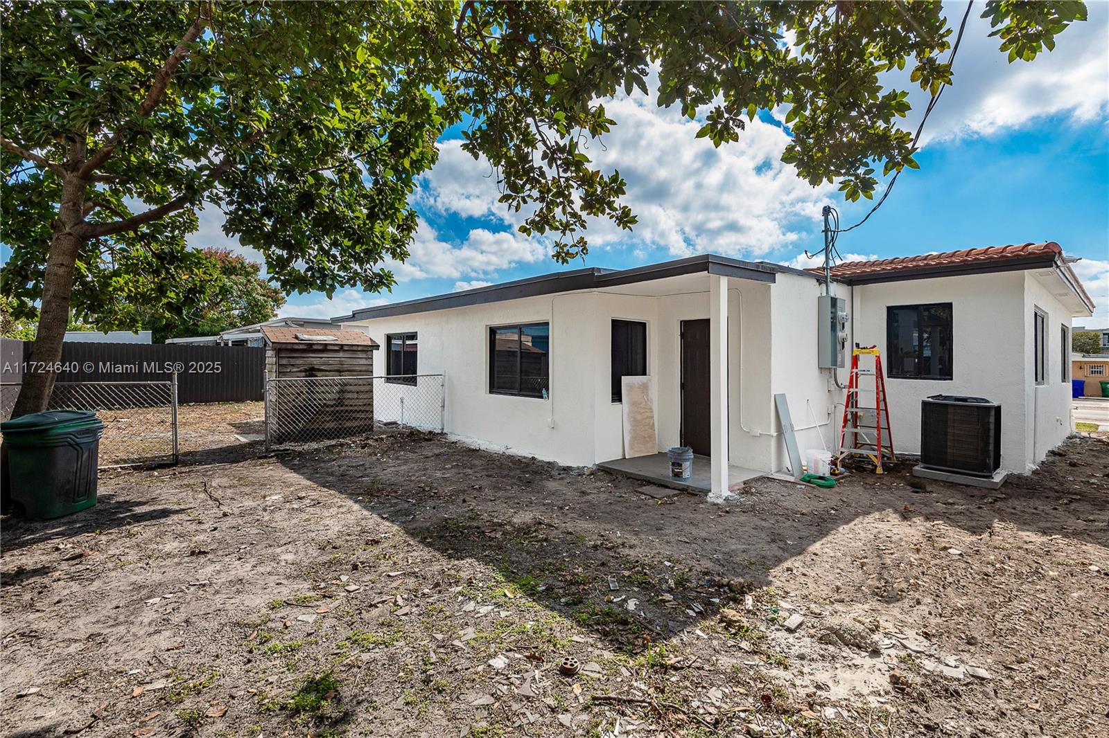 Coral Gate Miami, FL 33135 - Photo 3 of 23 a view of a backyard with a large tree
