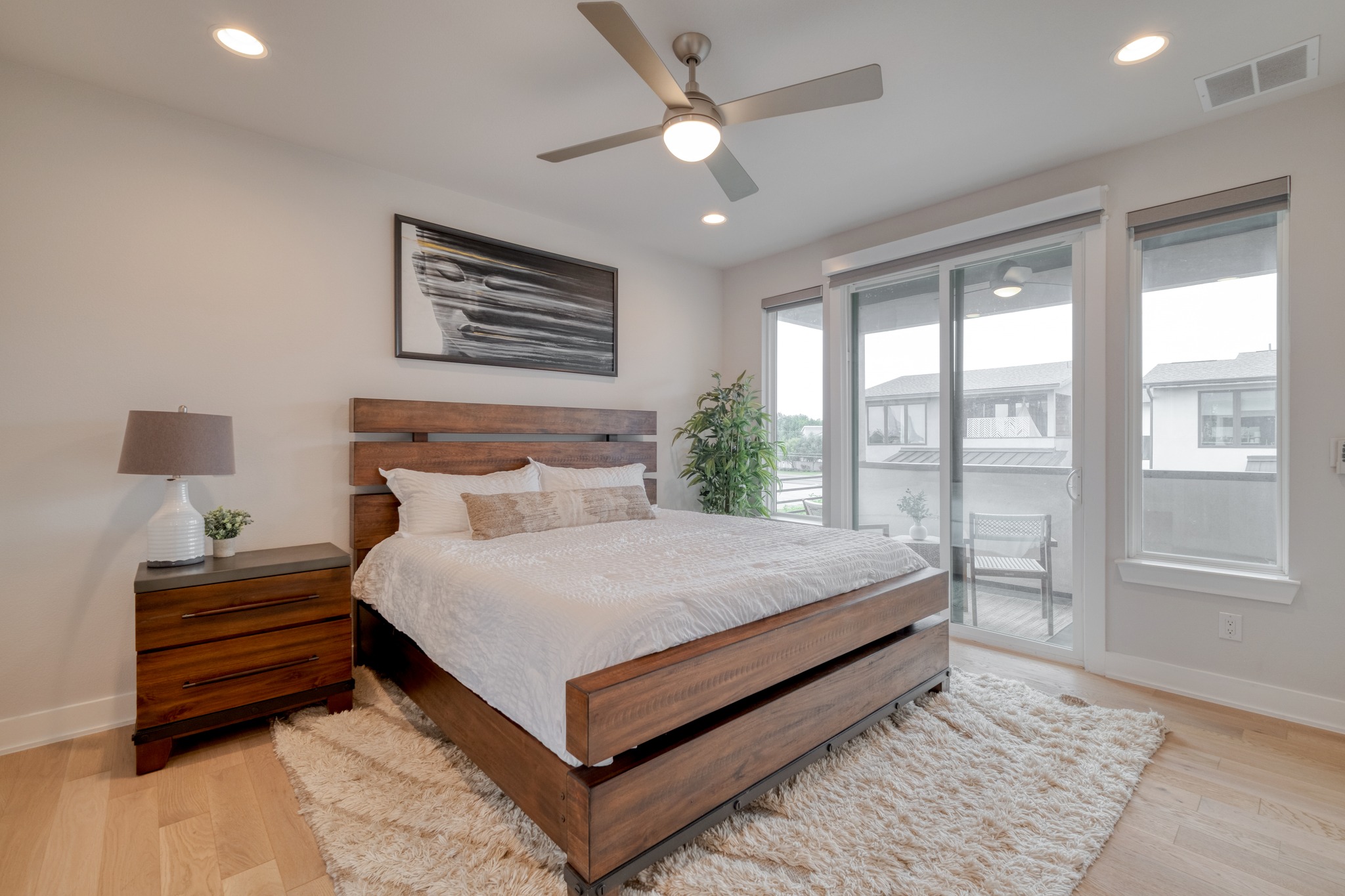 5002 Pecan Springs Road, Unit 7 Austin, TX 78723 - Photo 19 of 34 The primary suite on the third floor is a quiet space with plenty of room for a king-sized bed and additional seating