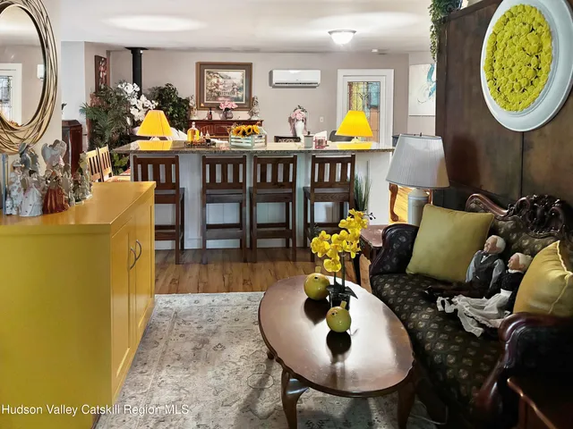a view of a bathroom with a sink and mirror