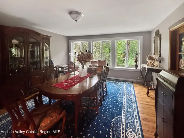 a kitchen with a table and chairs
