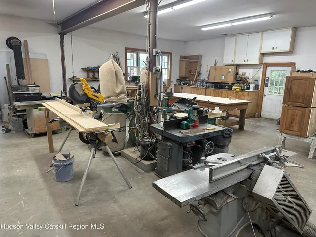 a big yard with lots of green space and deers