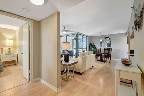 a living room with furniture and a view of living room