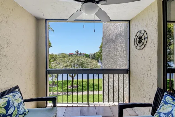 a view of a porch with furniture