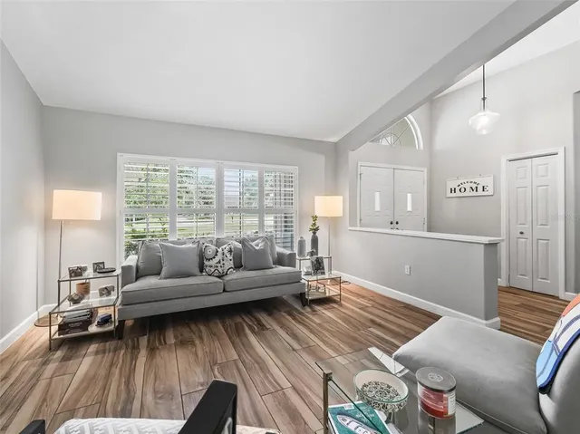 a view of a dining room with furniture window and outside view