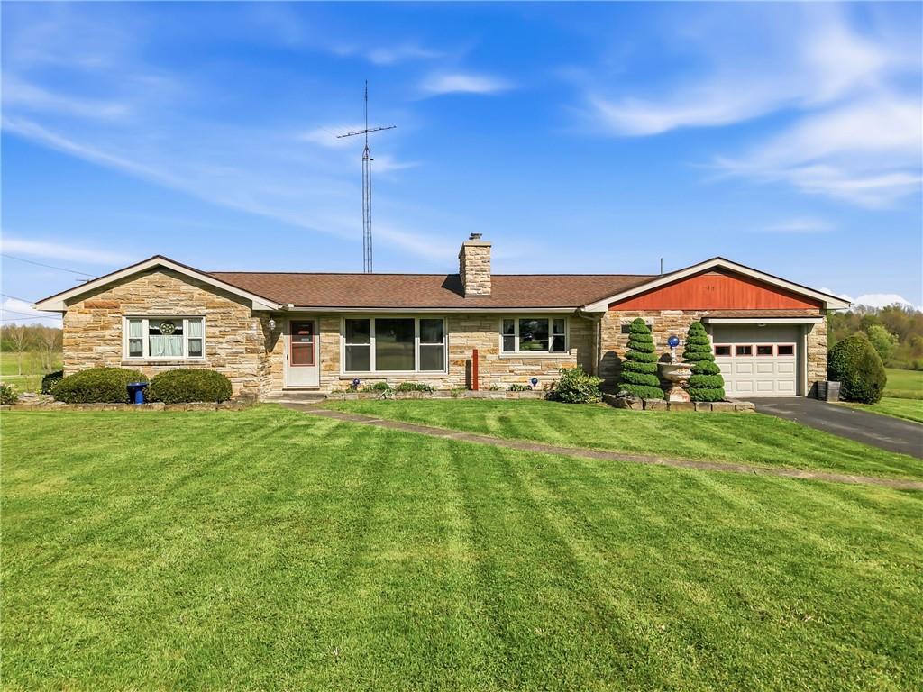 3344 Perry Highway Hadley, PA 16130 - Photo 1 of 50 a front view of house with yard and green space