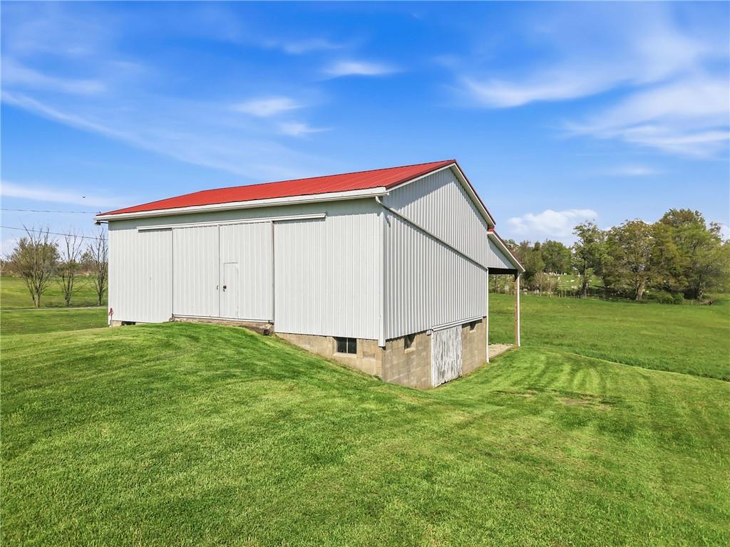 3344 Perry Highway Hadley, PA 16130 - Photo 11 of 50 a view of a house with backyard and garden