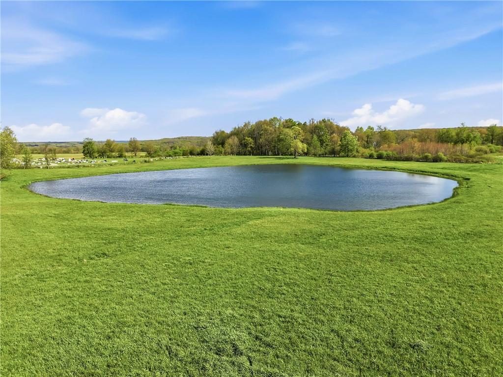 3344 Perry Highway Hadley, PA 16130 - Photo 15 of 50 a view of a lake with houses in the back
