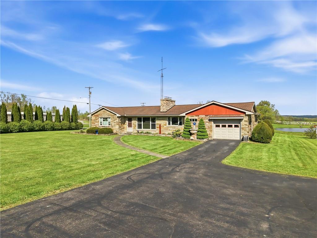 3344 Perry Highway Hadley, PA 16130 - Photo 2 of 50 a view of an house with swimming pool garden and trees
