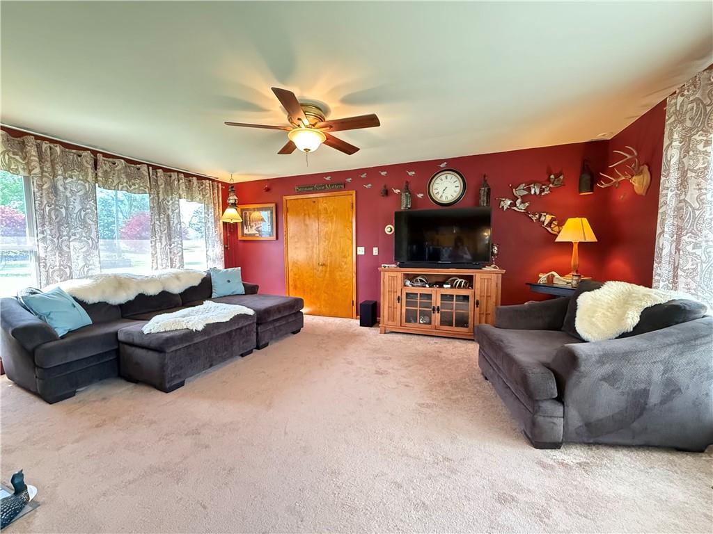 3344 Perry Highway Hadley, PA 16130 - Photo 29 of 50 a living room with furniture and a flat screen tv