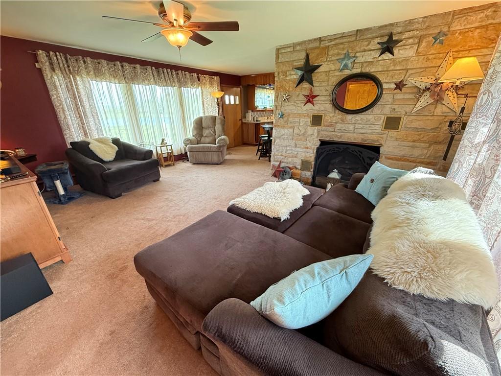 3344 Perry Highway Hadley, PA 16130 - Photo 30 of 50 a living room with furniture and a fireplace