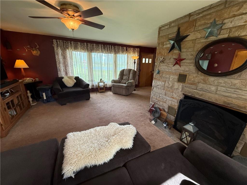 3344 Perry Highway Hadley, PA 16130 - Photo 31 of 50 a living room with furniture and a fireplace