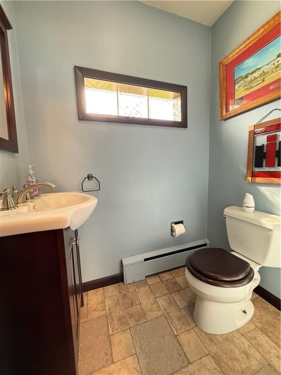 3344 Perry Highway Hadley, PA 16130 - Photo 33 of 50 a bathroom with a sink toilet and a mirror