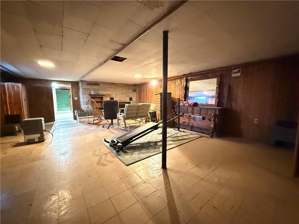 3344 Perry Highway Hadley, PA 16130 - Photo 49 of 50 a living room with furniture a table and gym equipment