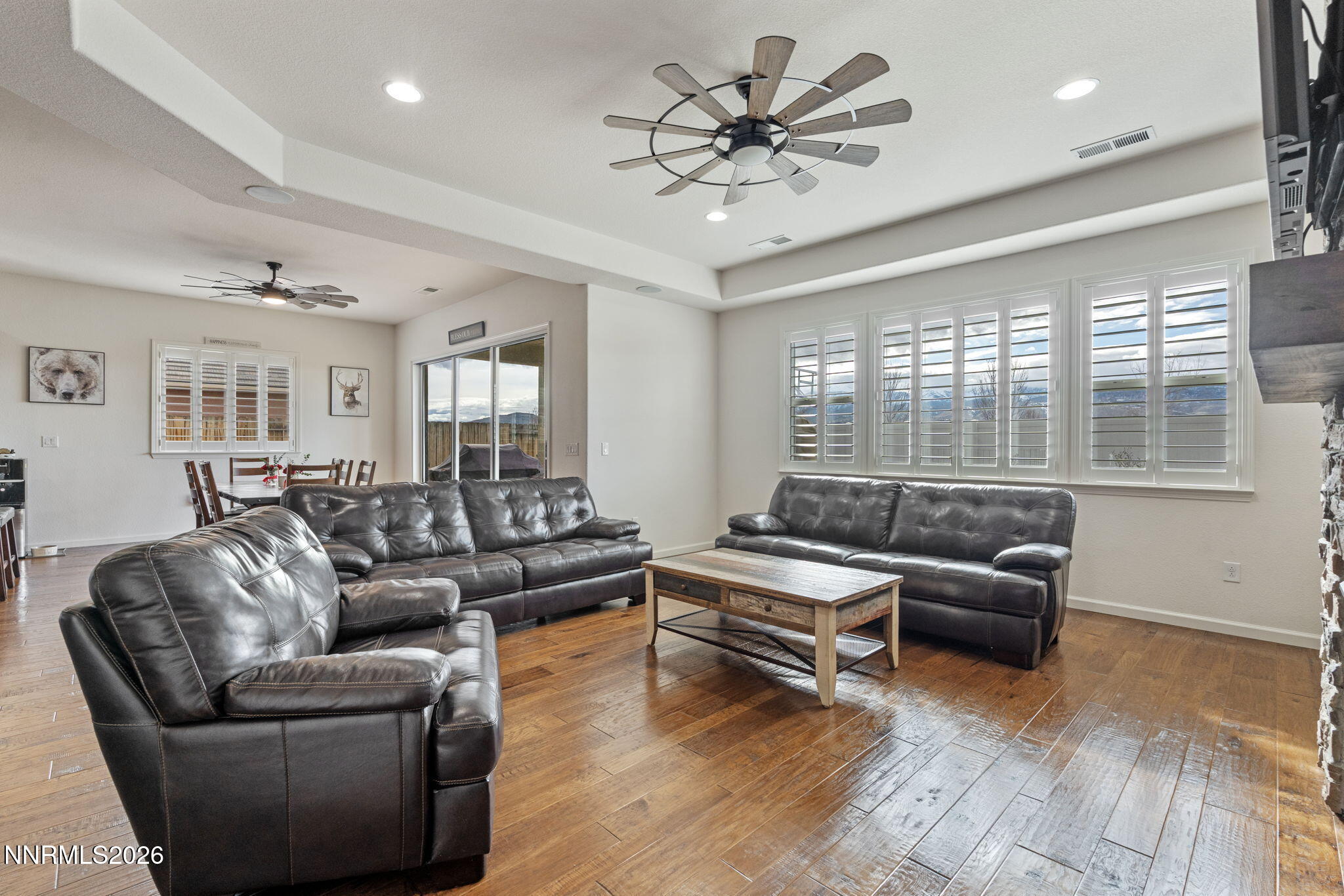 9811 Dyevera Lane Reno, NV 89521 - Photo 16 of 32 a living room with furniture and a large window
