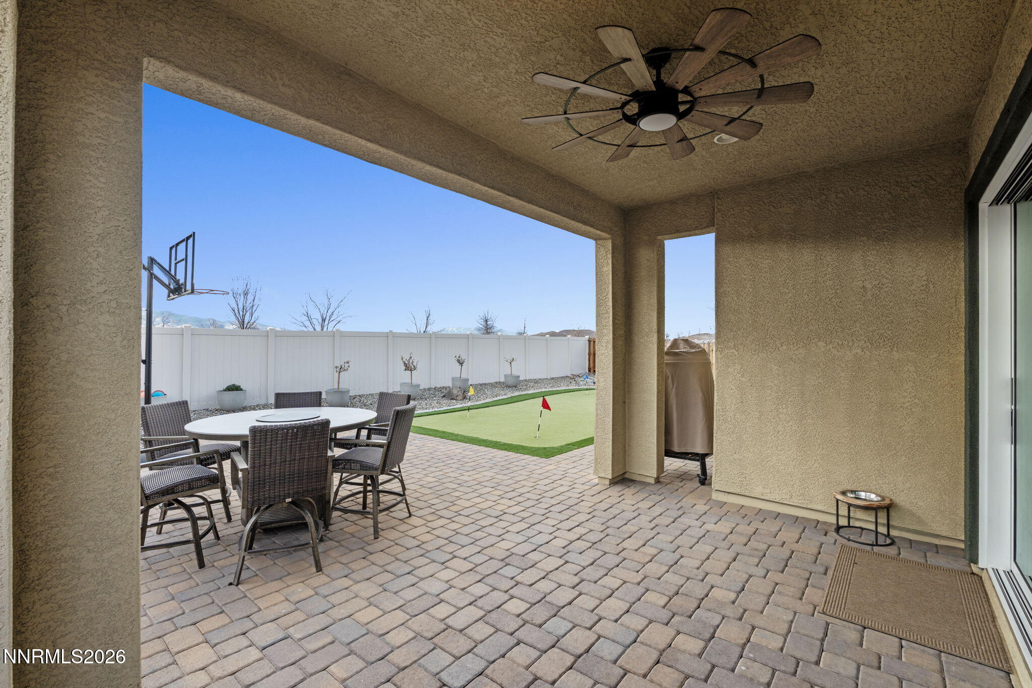 9811 Dyevera Lane Reno, NV 89521 - Photo 29 of 32 a view of a dining room with furniture