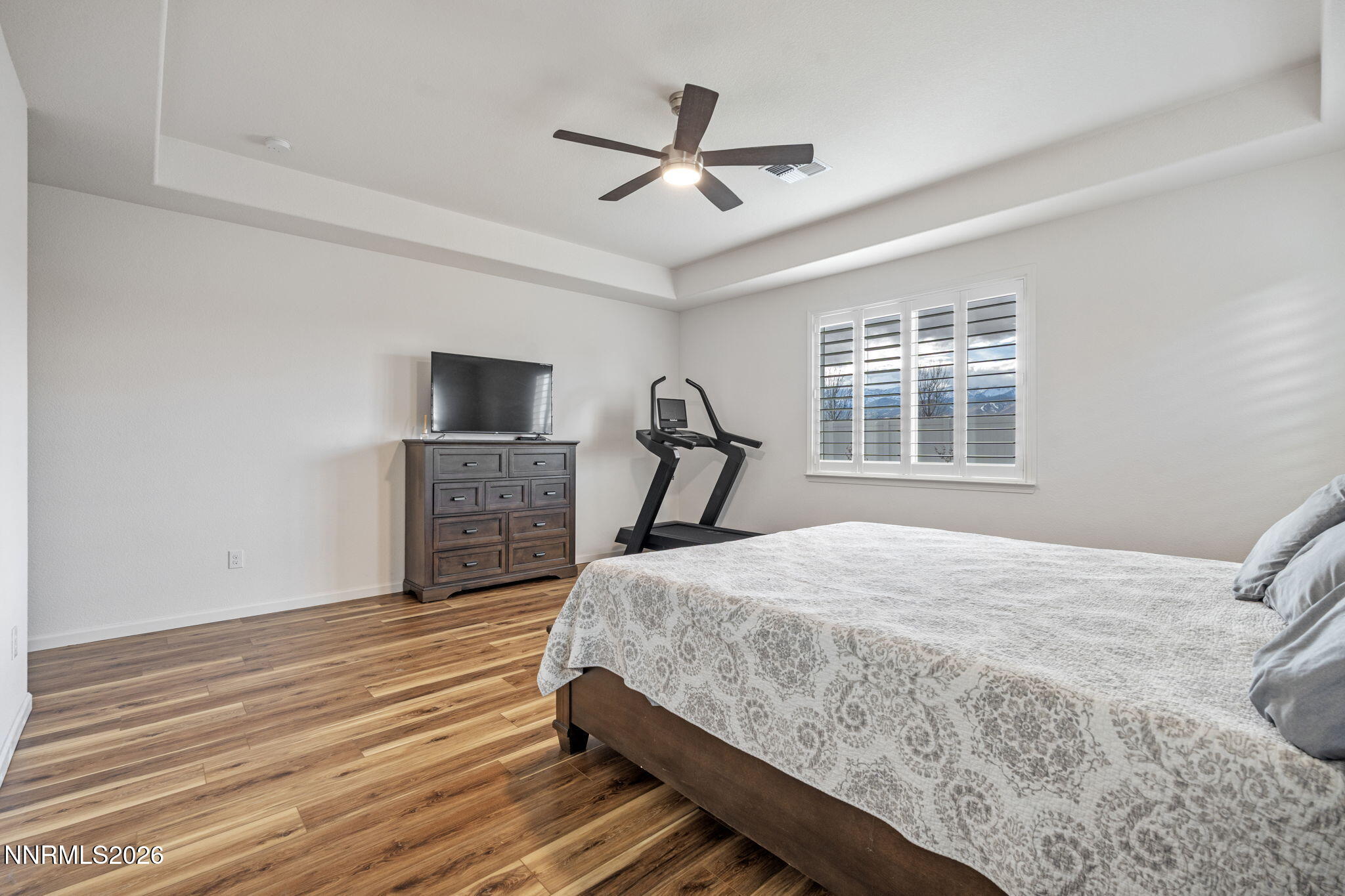 9811 Dyevera Lane Reno, NV 89521 - Photo 5 of 32 a bedroom with a bed ceiling fan and window
