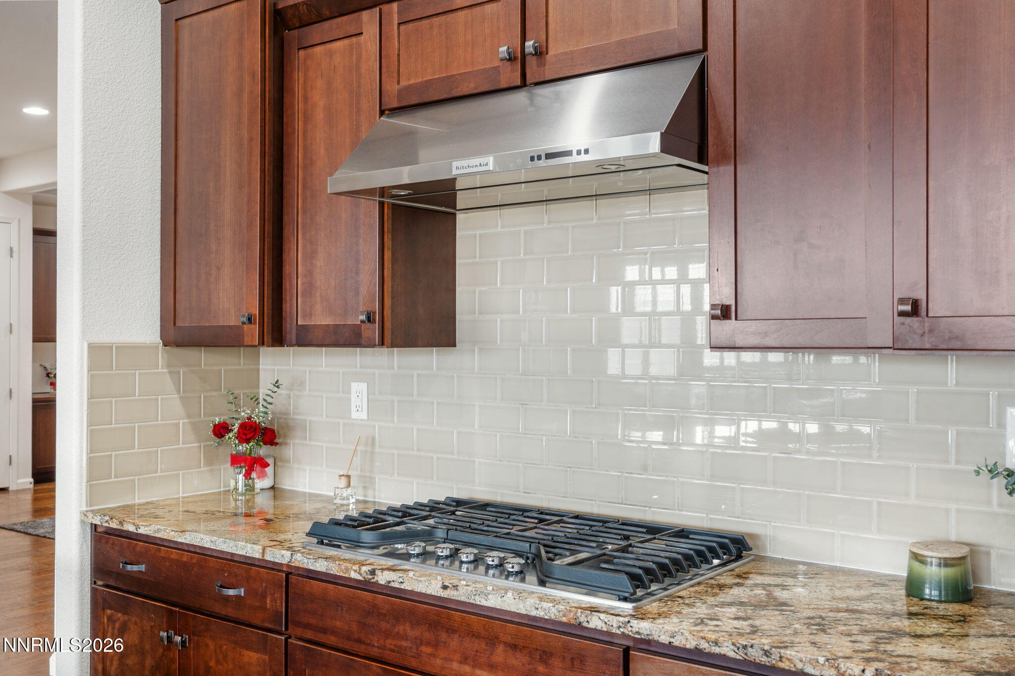 9811 Dyevera Lane Reno, NV 89521 - Photo 10 of 32 a kitchen with a stove and cabinets