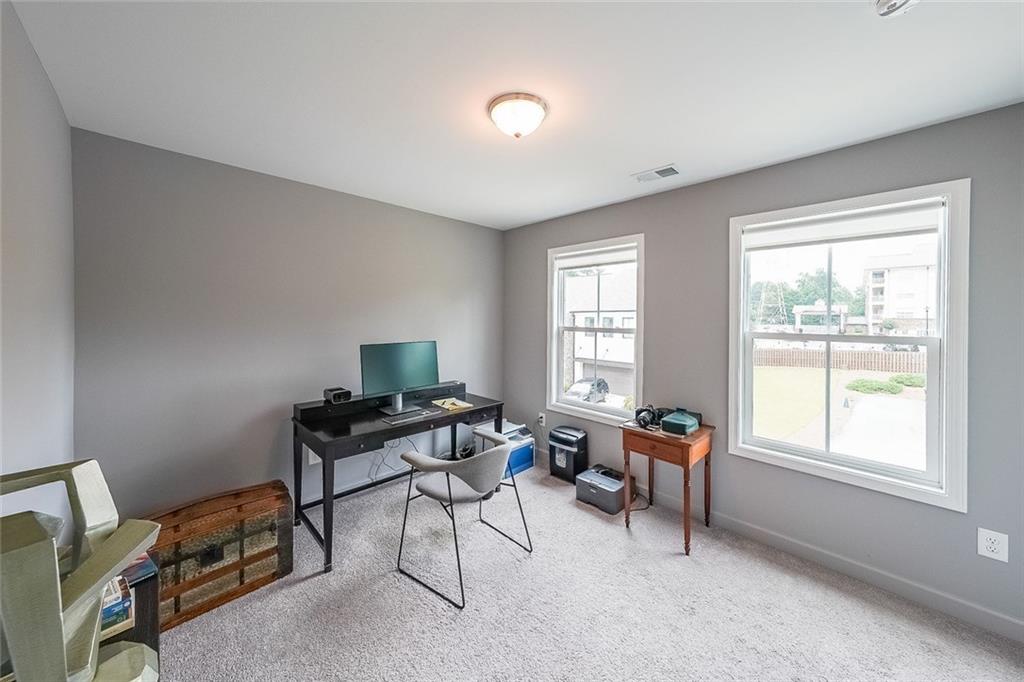 1024 Rohner Way Smyrna, GA 30080 - Photo 12 of 17 a workspace with furniture and a window