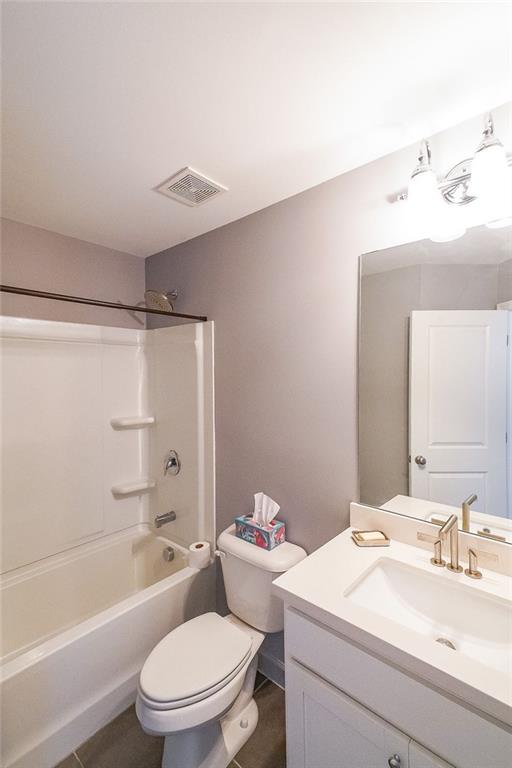 1024 Rohner Way Smyrna, GA 30080 - Photo 13 of 17 a bathroom with a sink toilet vanity and shower