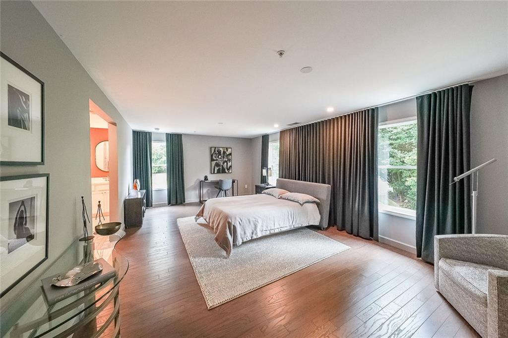 1024 Rohner Way Smyrna, GA 30080 - Photo 3 of 17 a spacious bedroom with a bed and a large window