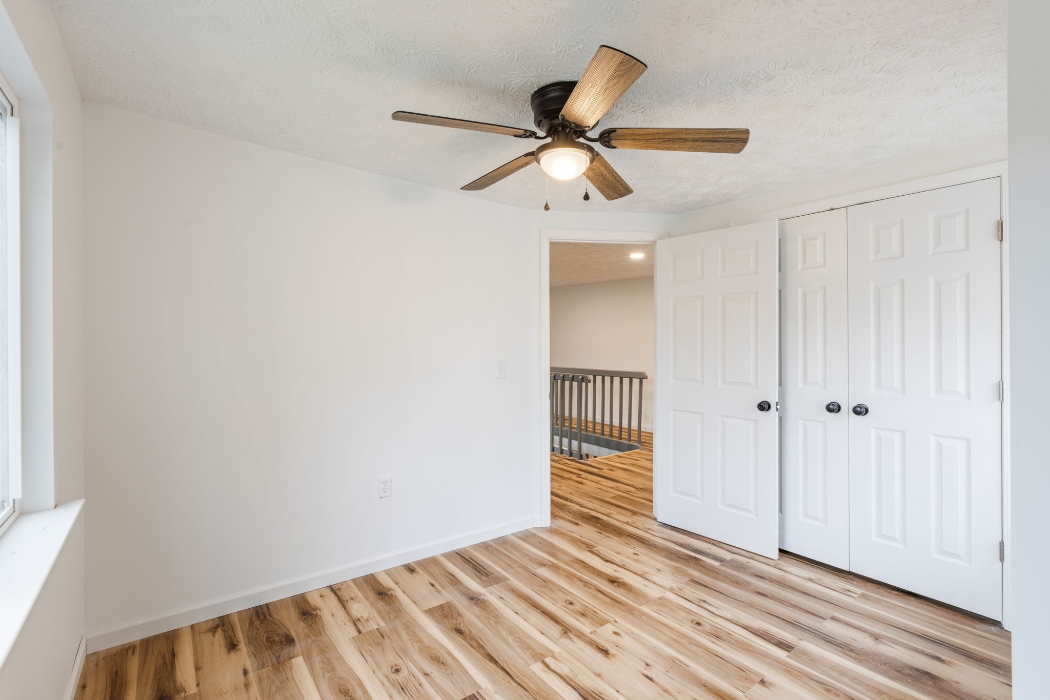 415 Durrett Street Springfield, TN 37172 - Photo 12 of 54 a view of an empty room and wooden floor