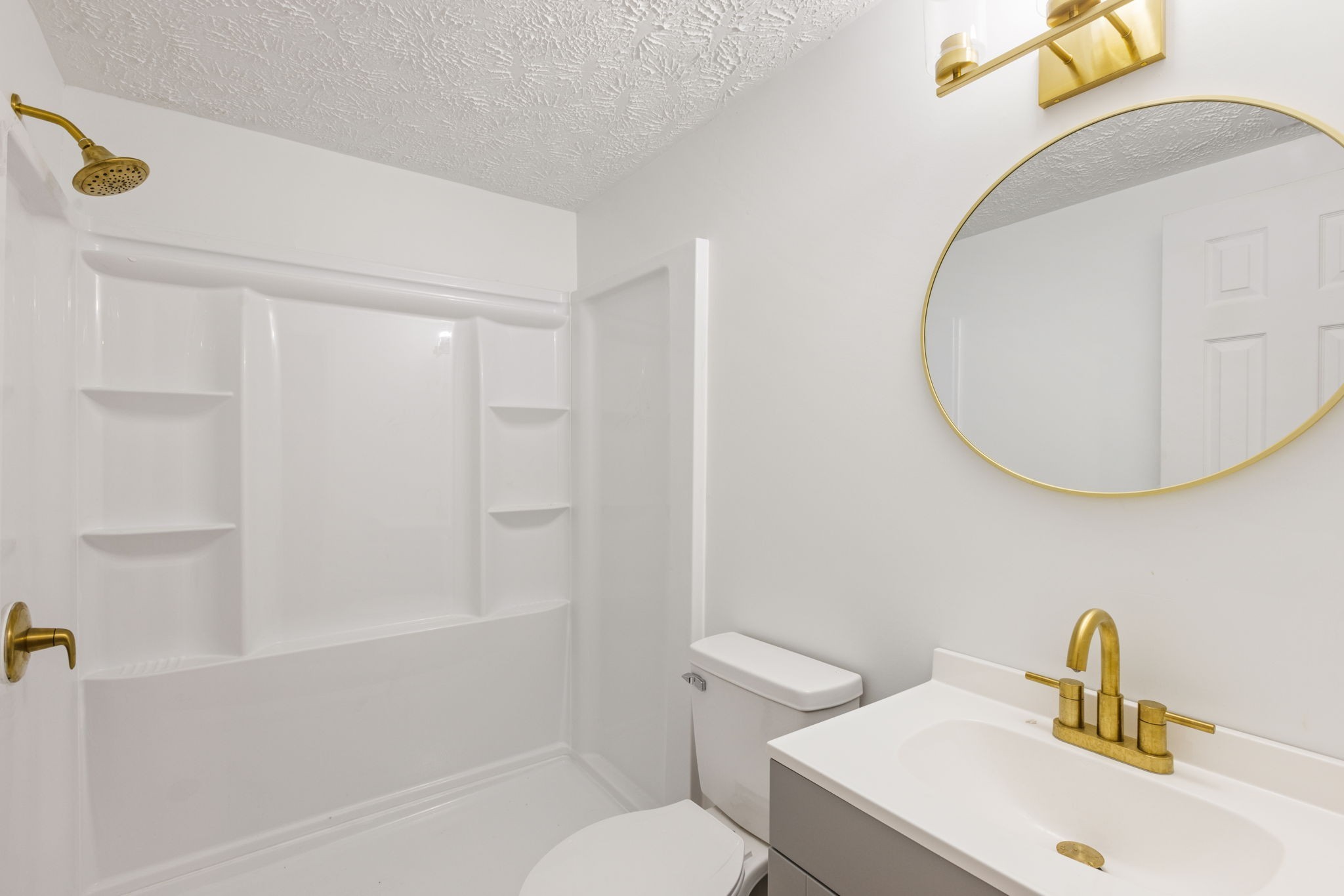 415 Durrett Street Springfield, TN 37172 - Photo 16 of 54 a bathroom with a sink a toilet and a mirror