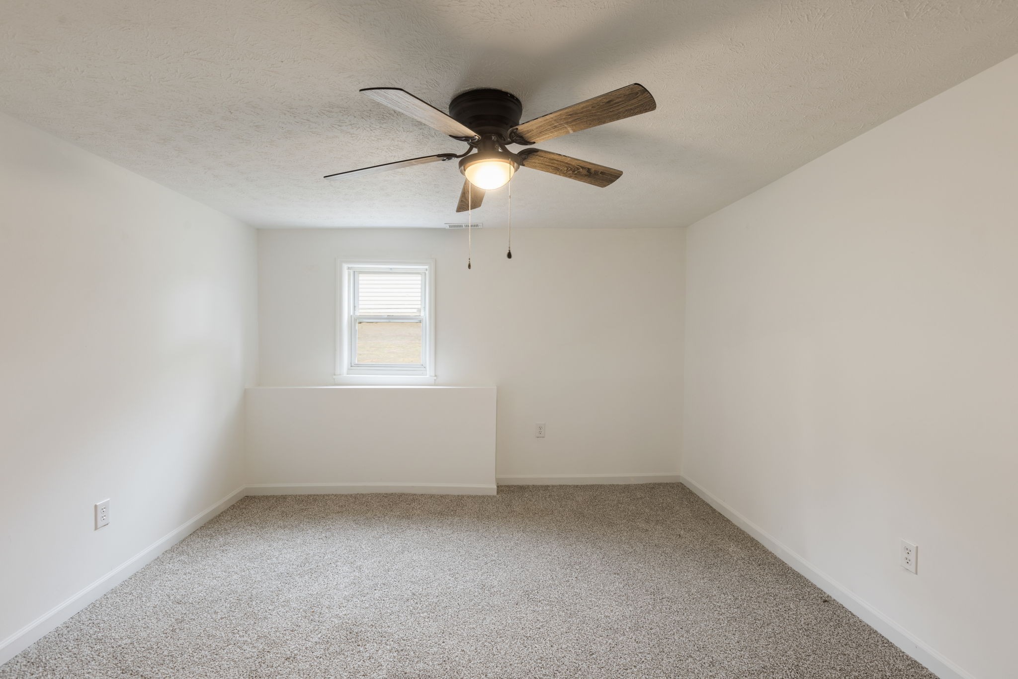 415 Durrett Street Springfield, TN 37172 - Photo 40 of 54 an empty room with a window and a fan