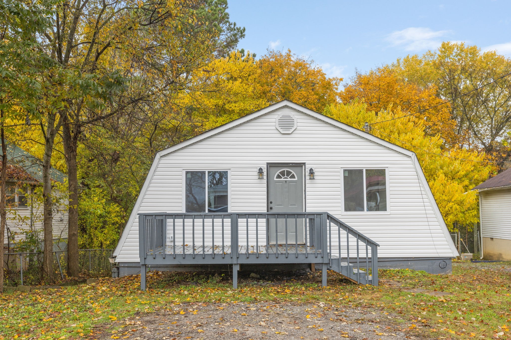 415 Durrett Street Springfield, TN 37172 - Photo 4 of 54 a view of a house with a wooden deck and a yard