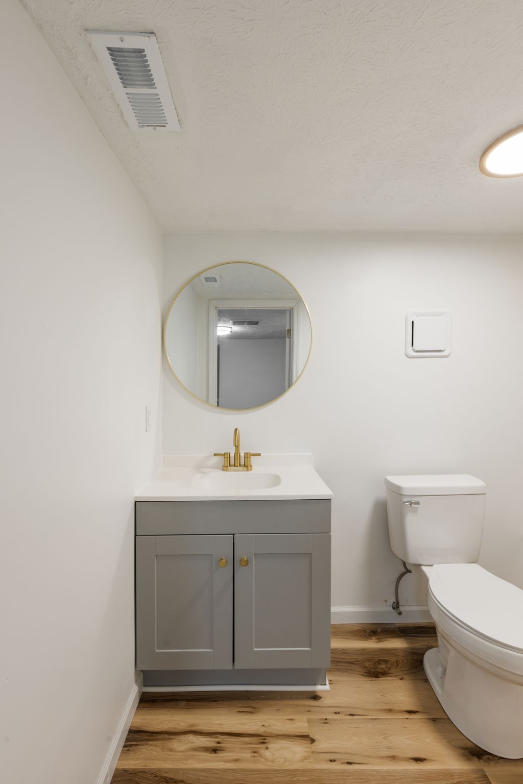 415 Durrett Street Springfield, TN 37172 - Photo 44 of 54 a bathroom with a toilet a sink and mirror