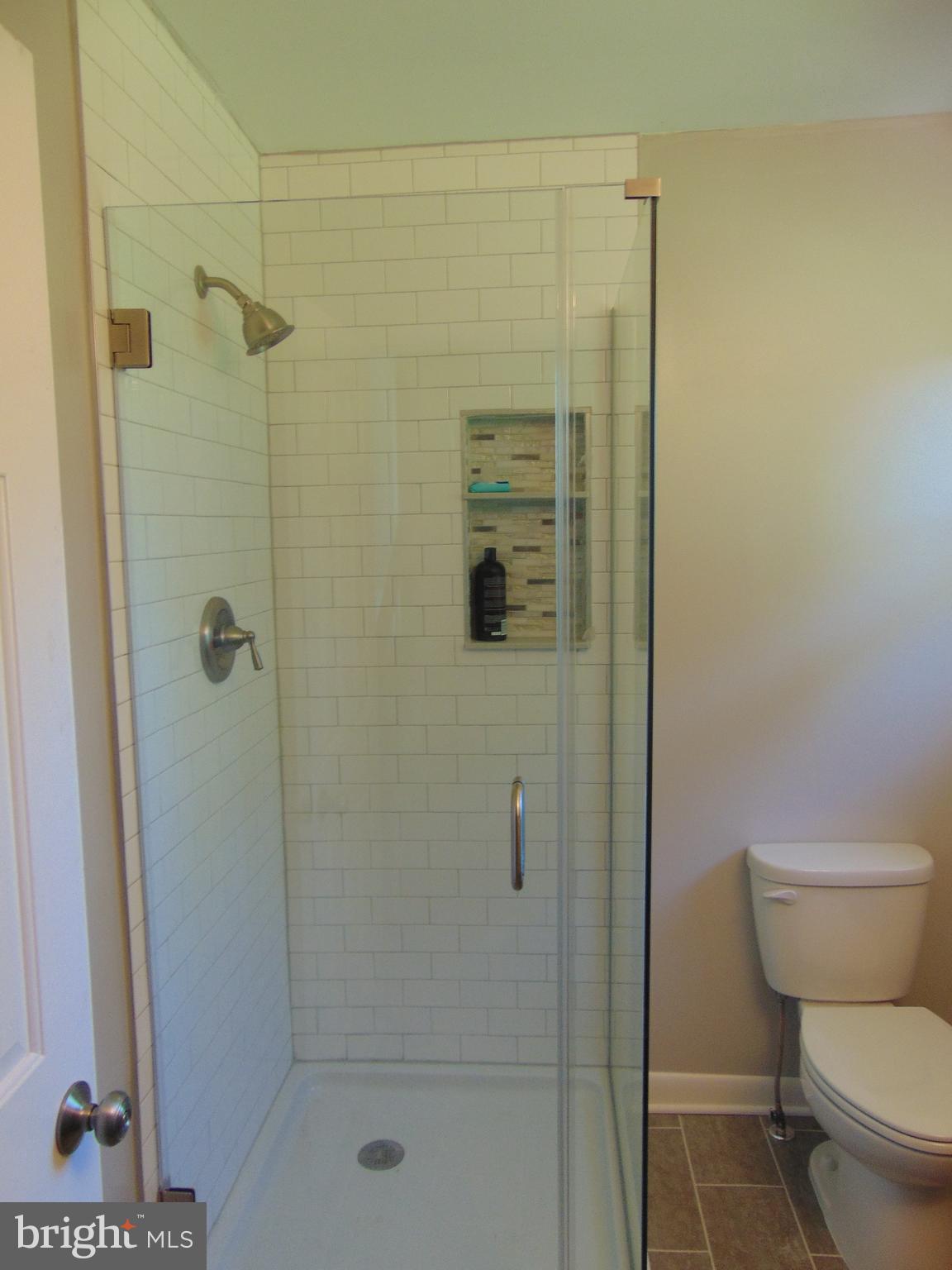 3706 Altondale Road Reisterstown, MD 21136 - Photo 14 of 27 a bathroom with a shower and a toilet