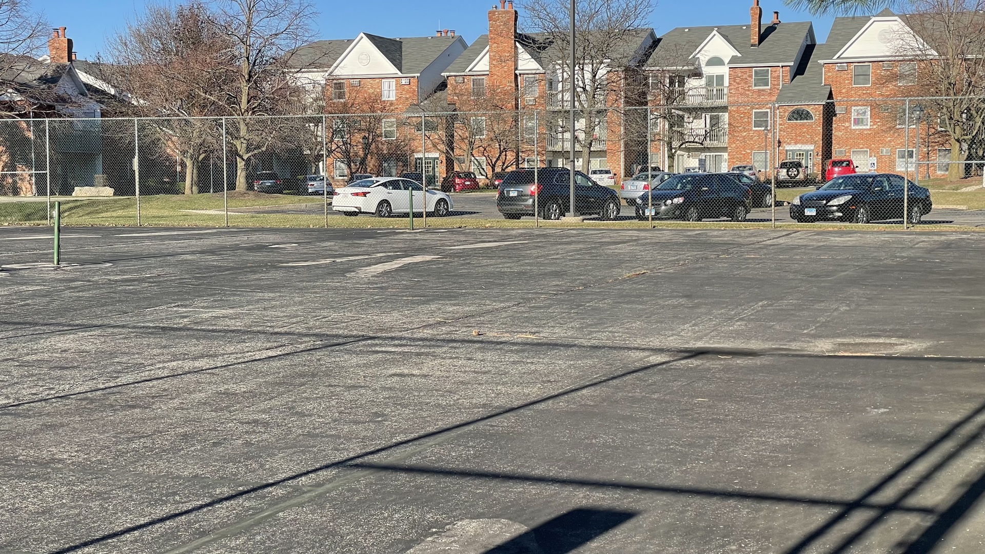 4301 West Shamrock Lane, Unit 2D McHenry, IL 60050 - Photo 13 of 18 a view of street with cars