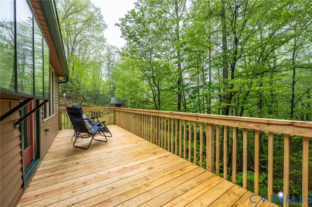 270 Little Cabin Road Amherst, VA 24521 - Photo 28 of 52 a view of balcony with wooden floor and outdoor seating