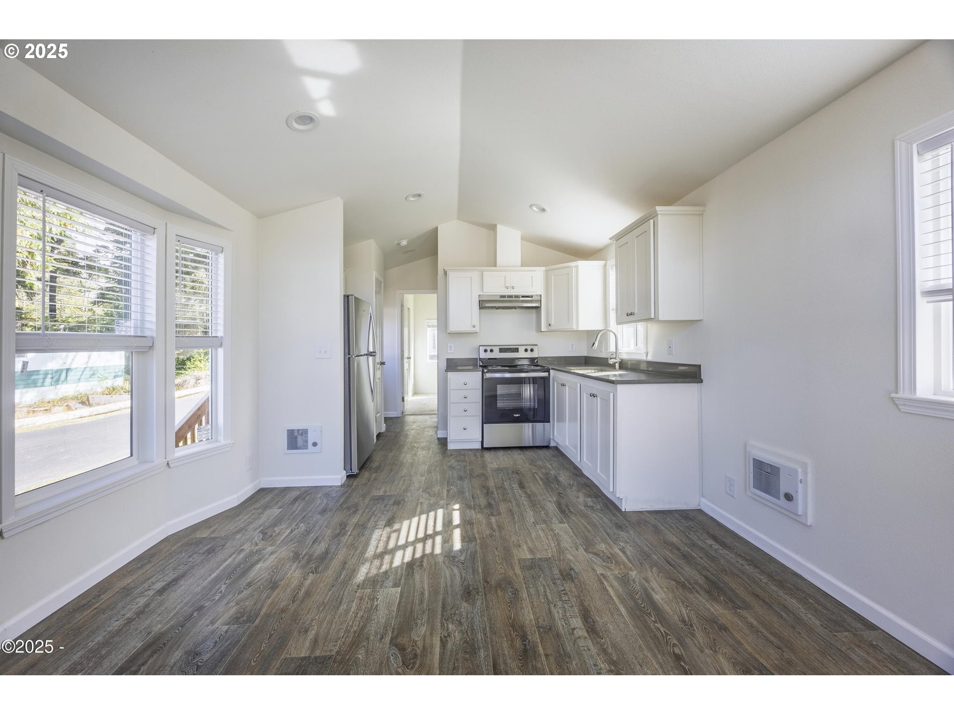 4875 Highway 101, Unit 96 Depoe Bay, OR 97341 - Photo 6 of 18 a view of kitchen with wooden floor