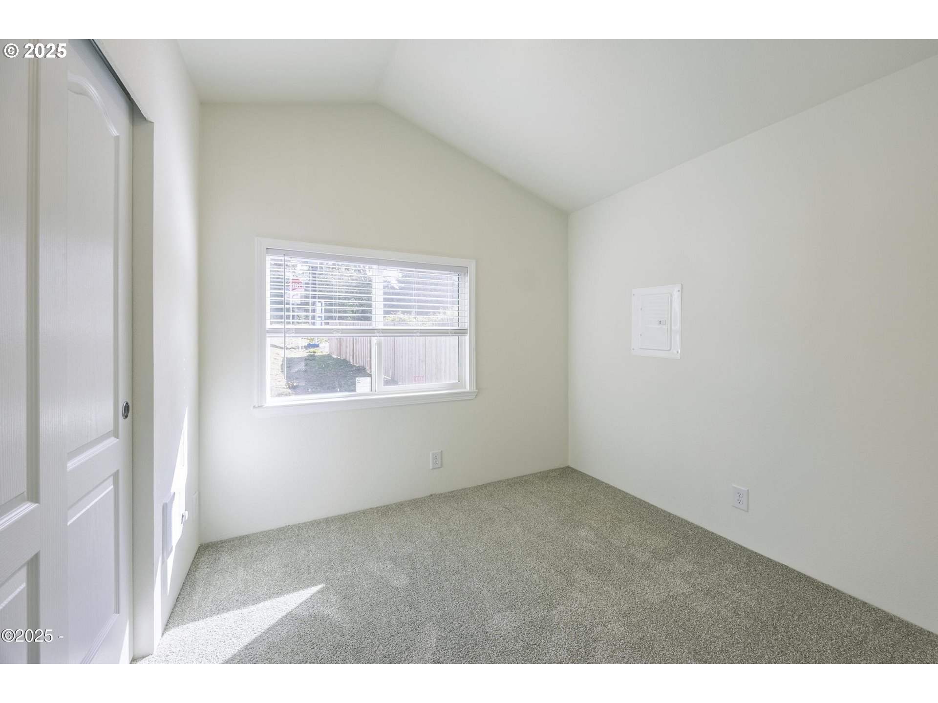 4875 Highway 101, Unit 96 Depoe Bay, OR 97341 - Photo 9 of 18 a view of an empty room with a window