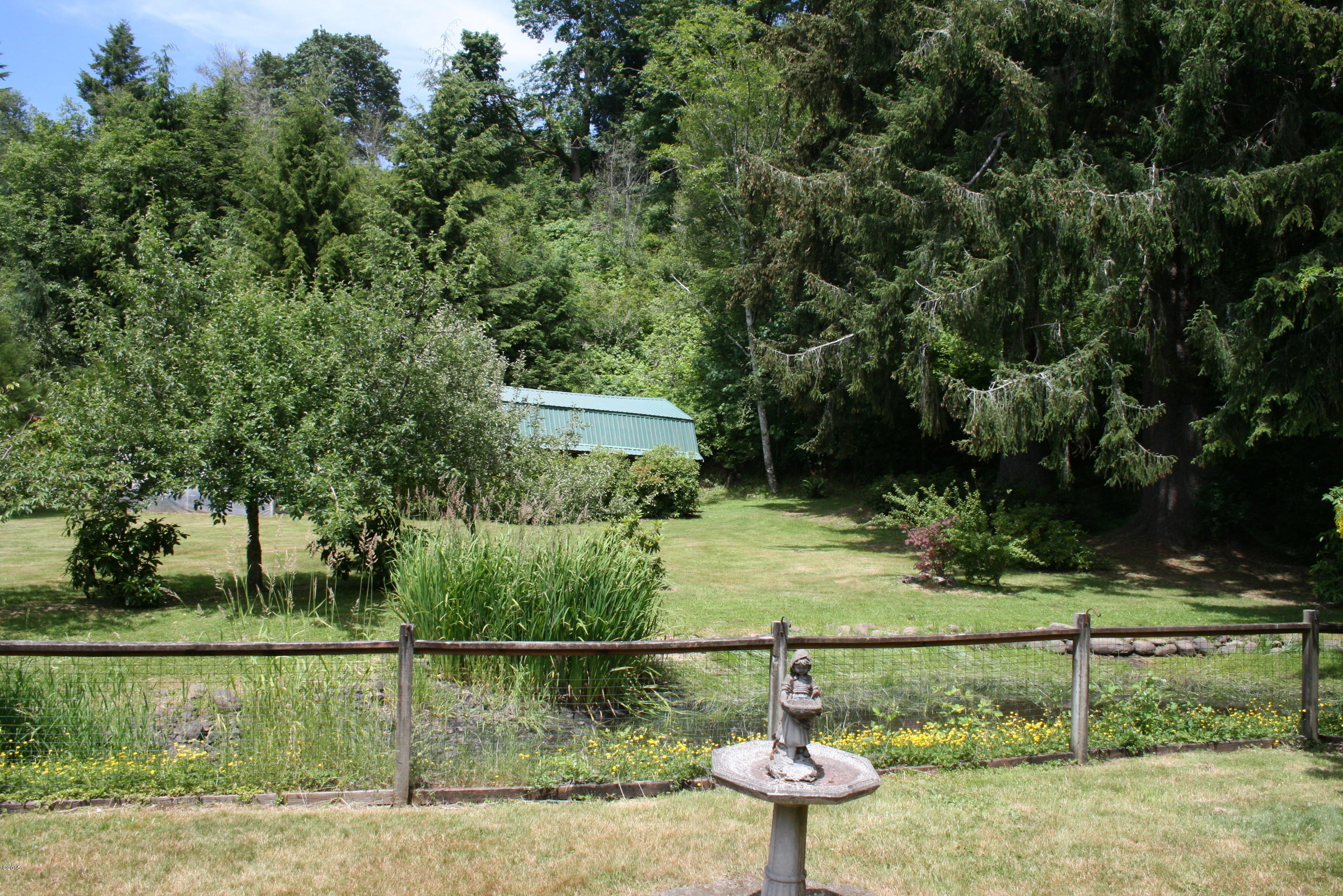 2431 North North Bank Road Otis, OR 97368 - Photo 5 of 33 Backyard