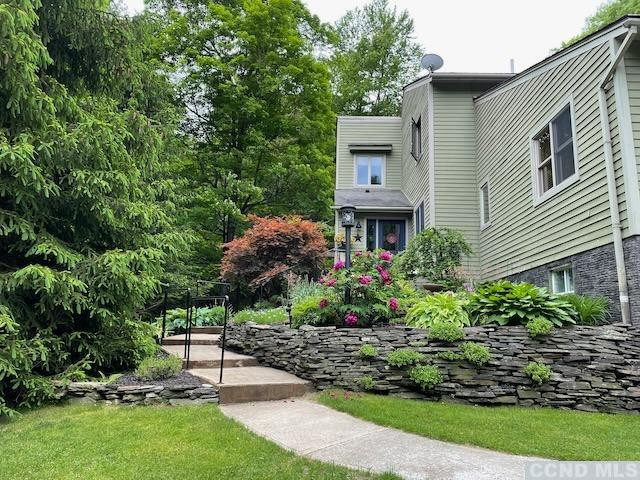 1325 County Rte 27 Craryville, NY 12521 - Photo 34 of 35 a view of a chair and table in backyard of the house