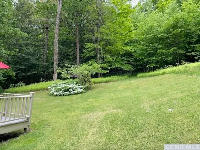 a view of garden with trees