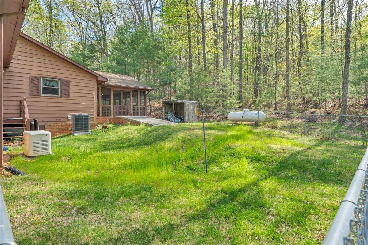 3878 Harborwood Road Salem, VA 24153 - Photo 42 of 60 a view of a house with pool and a yard