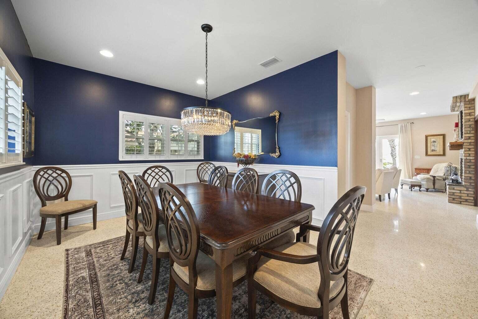 1009 Northwest Terrace Road Stuart, FL 34994 - Photo 18 of 69 a view of a dining room with furniture window and wooden floor