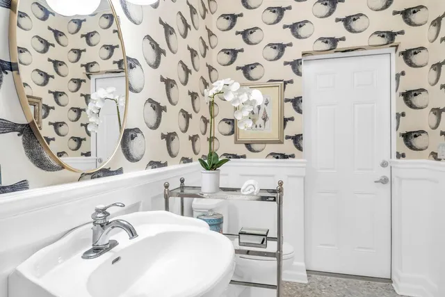 a view of a balcony with furniture