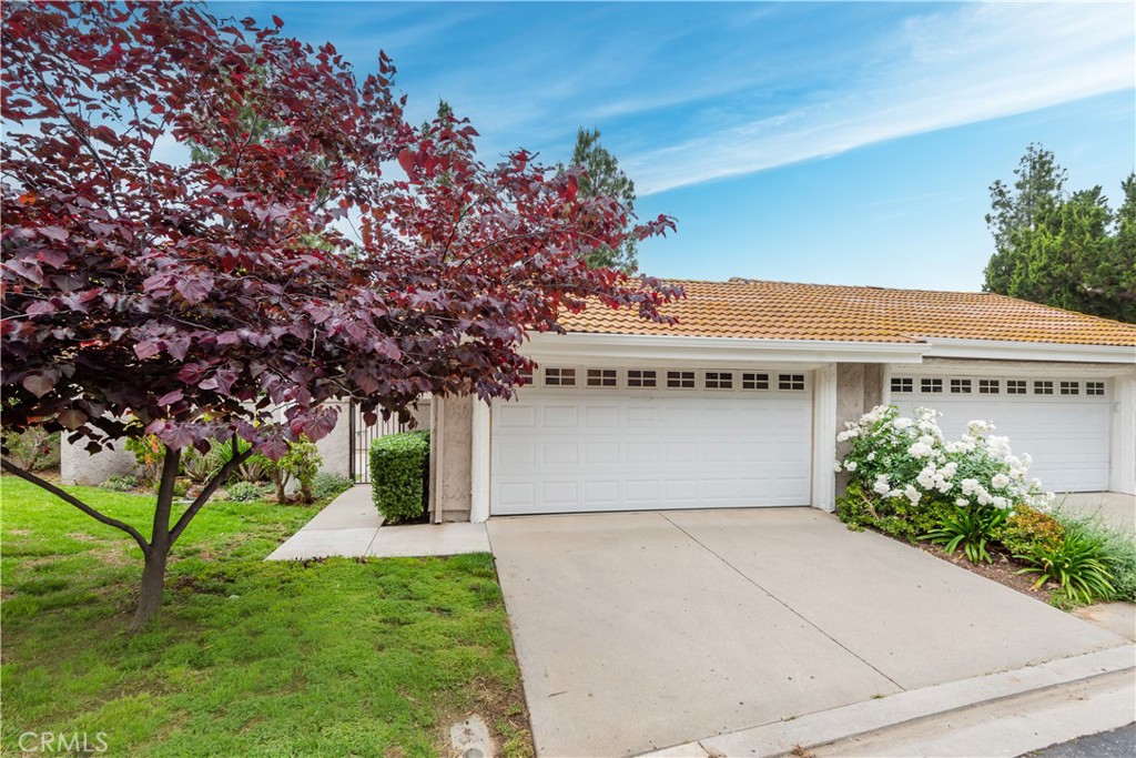 176 Conifer Circle Oak Park, CA 91377 - Photo 1 of 1 a front view of a building with garden