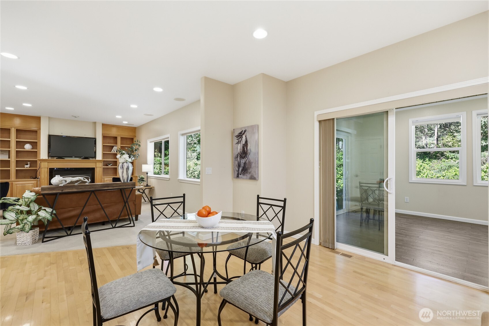 4354 Northwest Westgate Road Silverdale, WA 98383 - Photo 10 of 40 a view of a dining room with furniture window and wooden floor