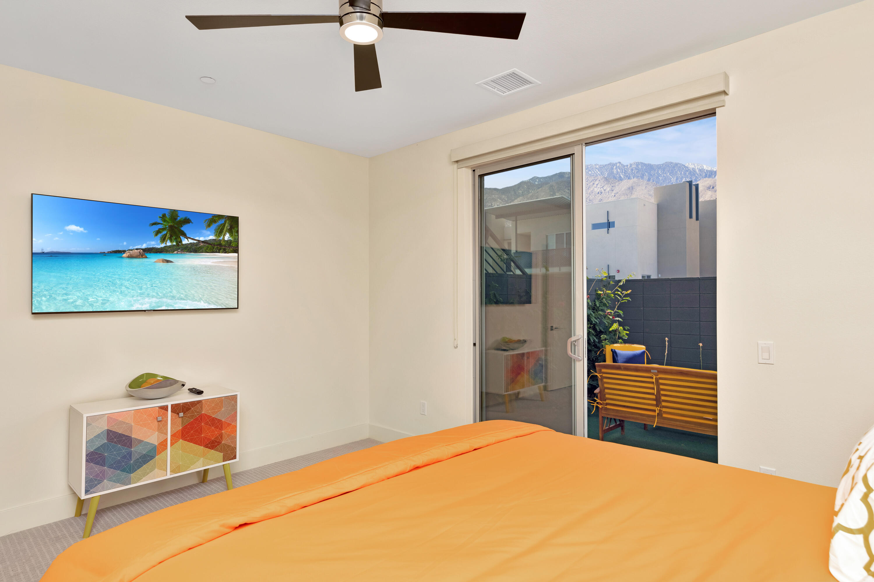 161 The River Palm Springs, CA 92262 - Photo 25 of 46 a bedroom with a bed and a view of kitchen