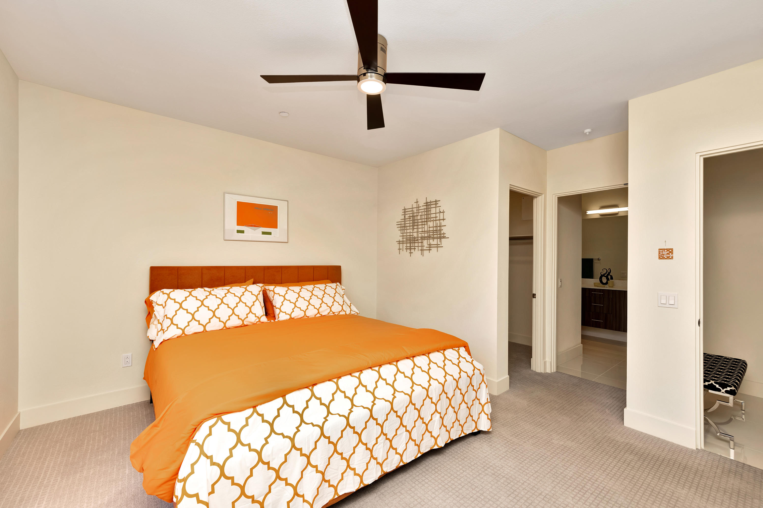 161 The River Palm Springs, CA 92262 - Photo 26 of 46 a bedroom with a bed and a view of kitchen