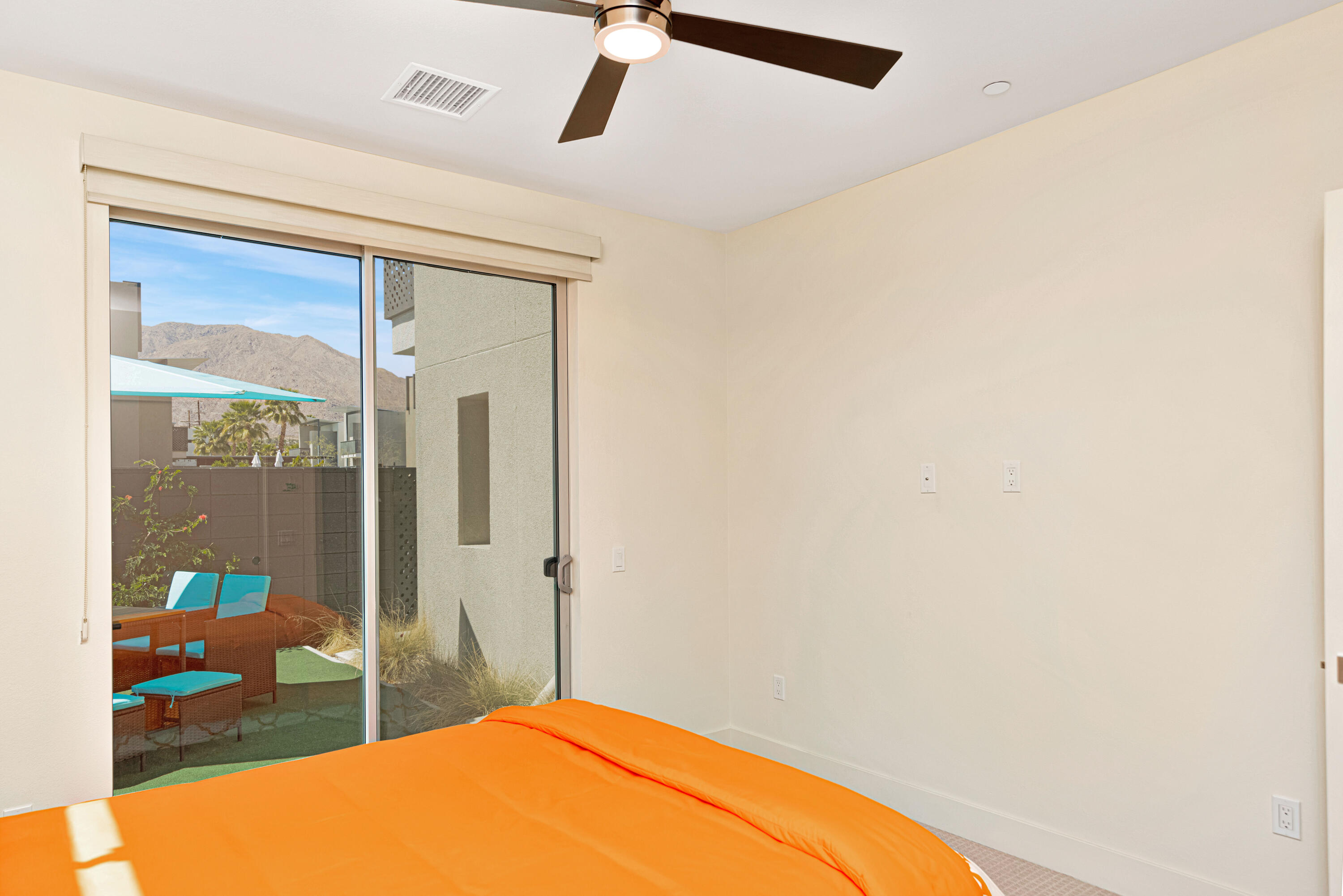 161 The River Palm Springs, CA 92262 - Photo 32 of 46 a bedroom with a bed and a dresser