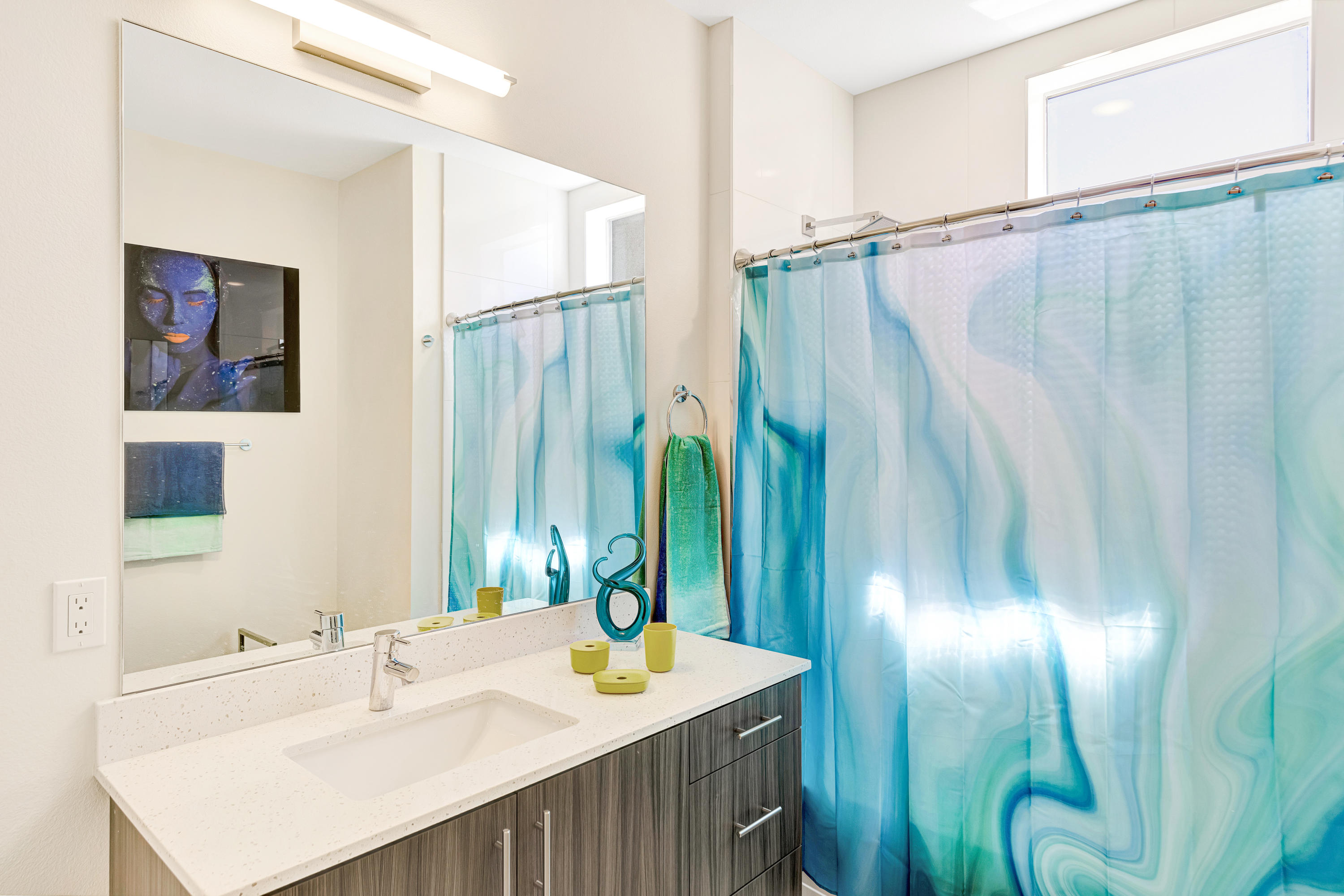 161 The River Palm Springs, CA 92262 - Photo 33 of 46 a bathroom with a sink and a mirror