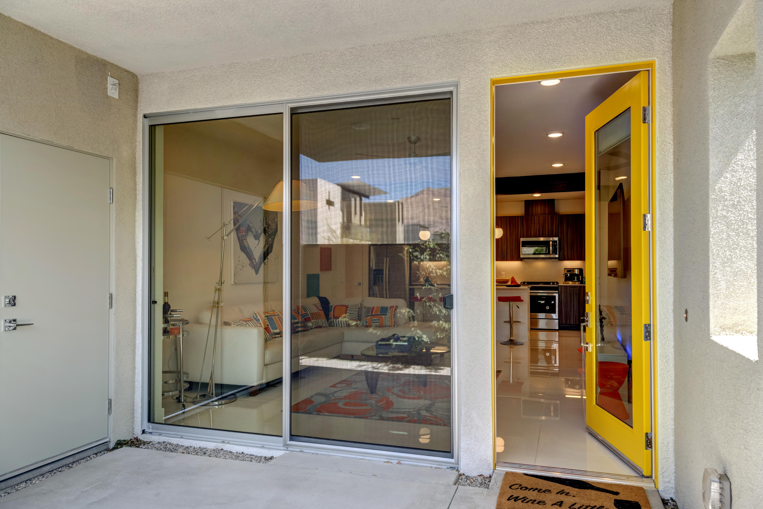 161 The River Palm Springs, CA 92262 - Photo 5 of 46 a bathroom with a glass shower door