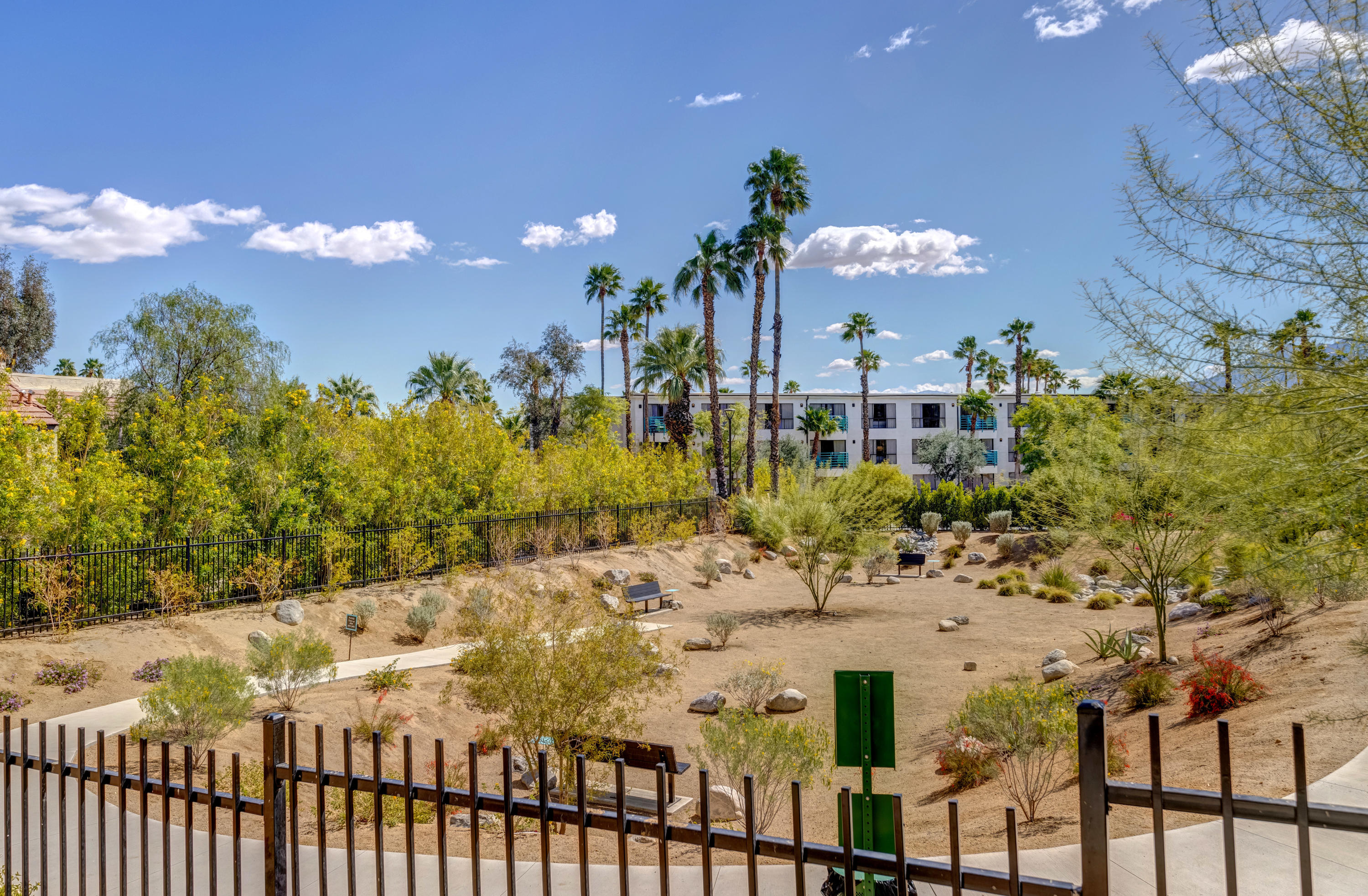 161 The River Palm Springs, CA 92262 - Photo 46 of 46 a view of a house with a yard