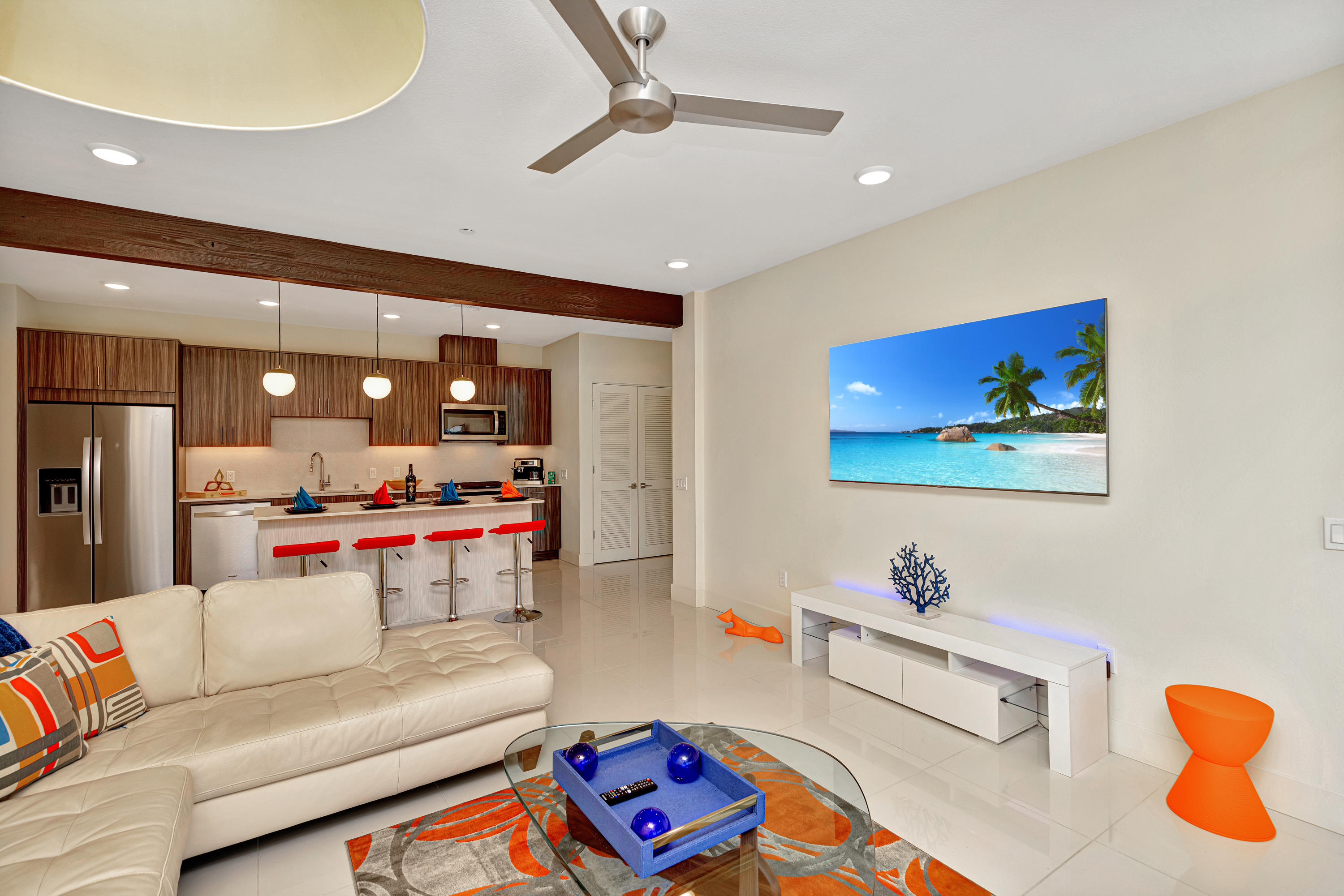 161 The River Palm Springs, CA 92262 - Photo 7 of 46 a living room with furniture and a flat screen tv